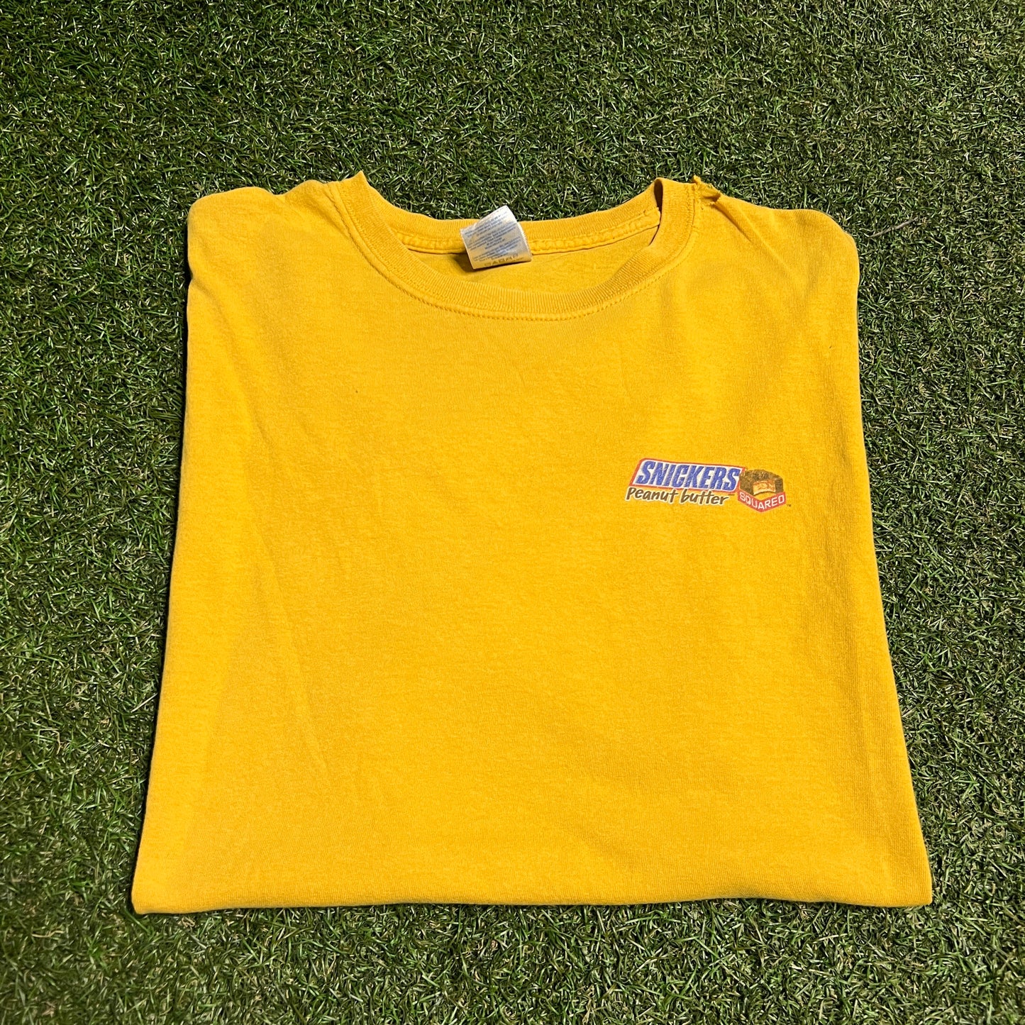 Y2K Snickers Training Wheels Yellow Tee Size XL USED v16584