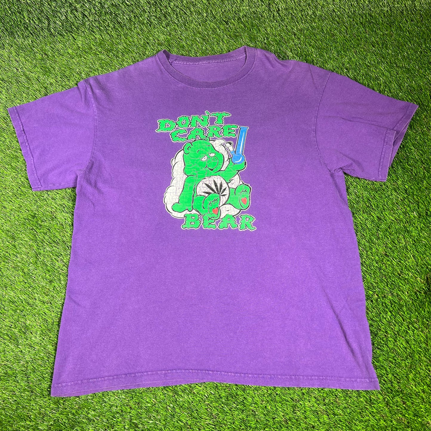 "Don't Care Bear" Purple Tee Size Medium USED v16634