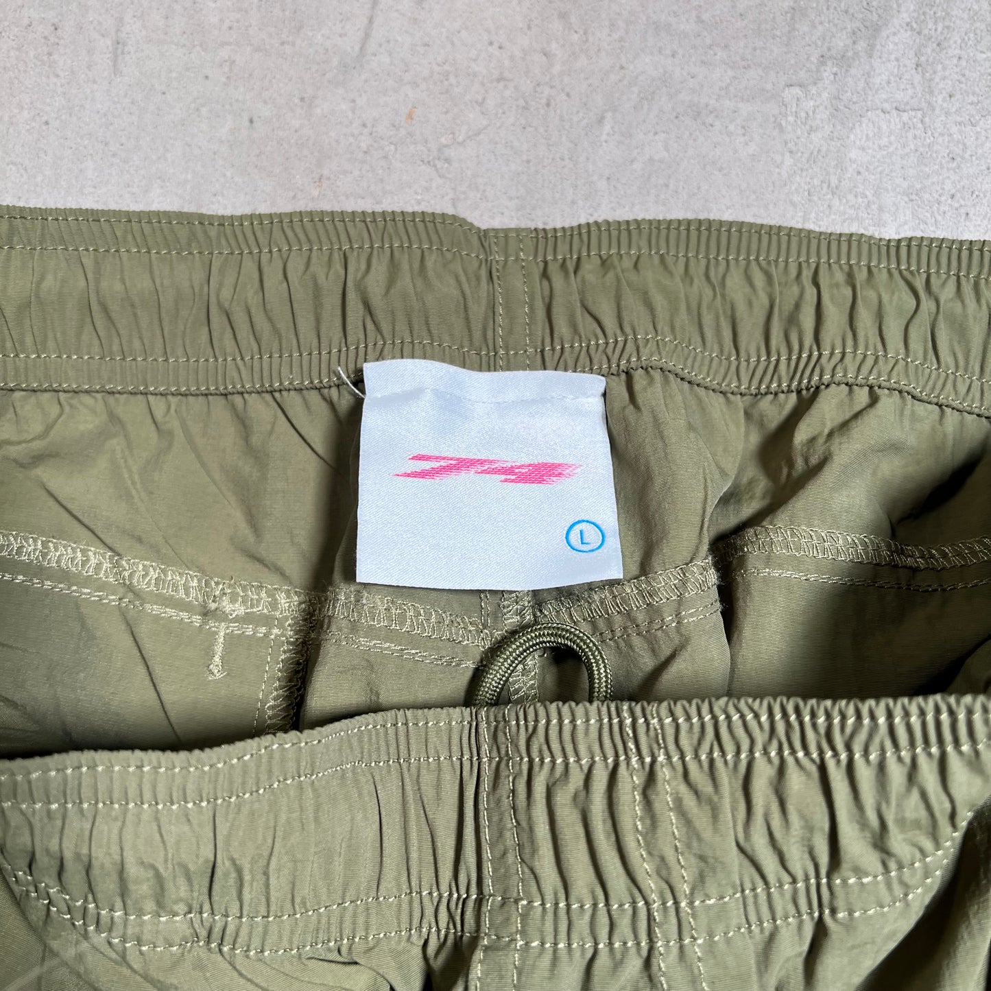 74 is War BGC Olive Green Racer Nylon Pants Size Large USED x17686