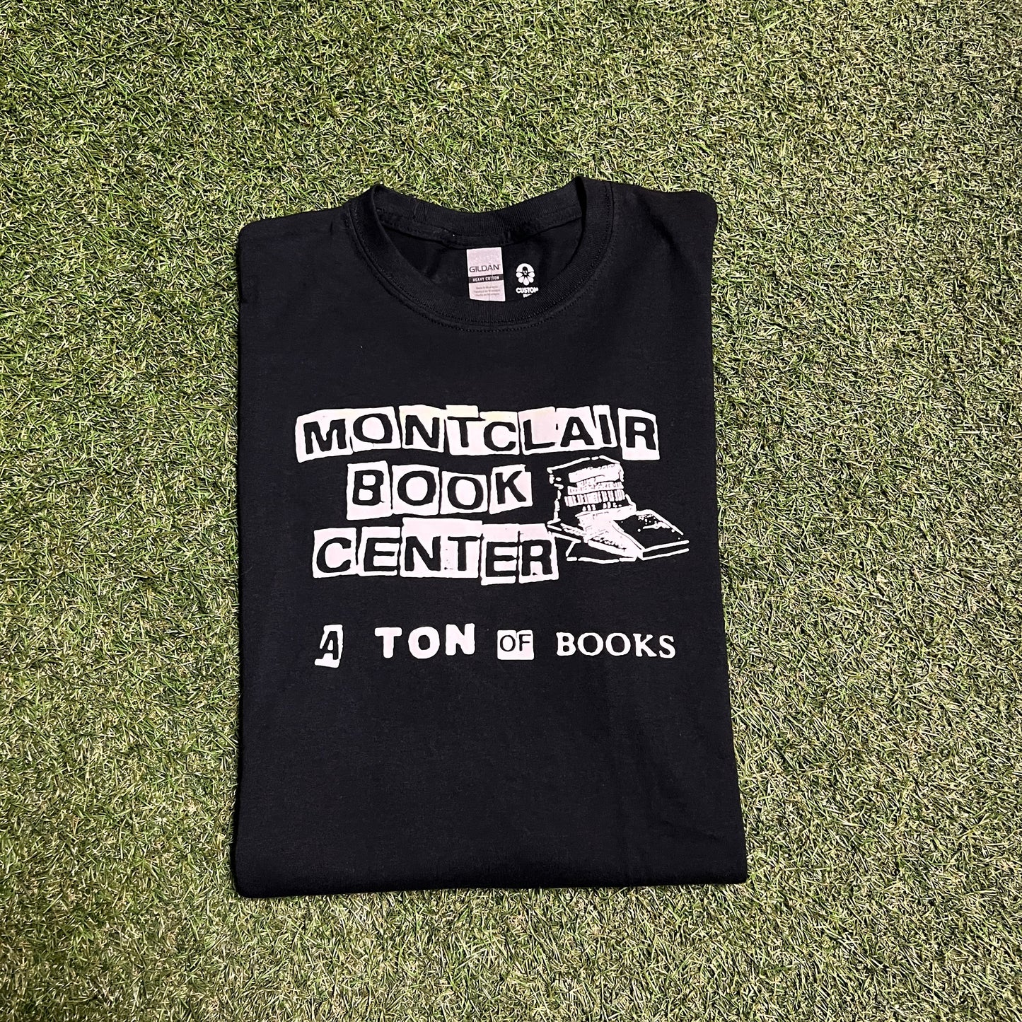 Montclair book center a ton of books tee black Size XL USED v11497