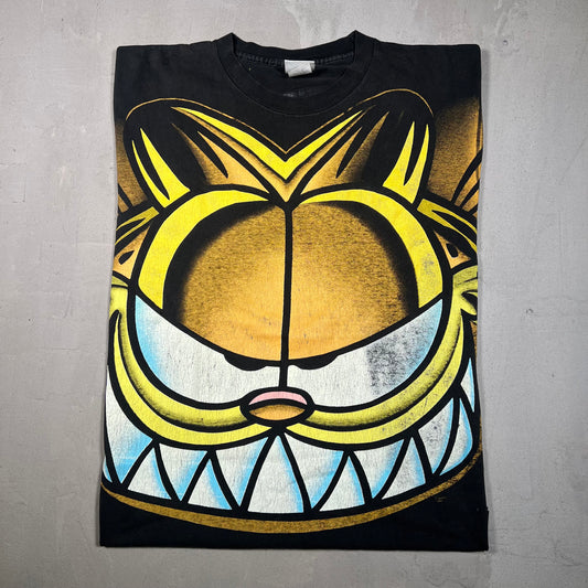 1990s Garfield the Cat AOP Black Tee Size Large USED v19158