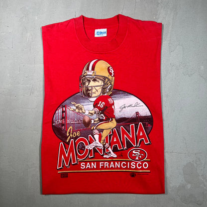 1987 Joe Montana San Franciso Cartoon Head Red Tee Size Medium USED v14617