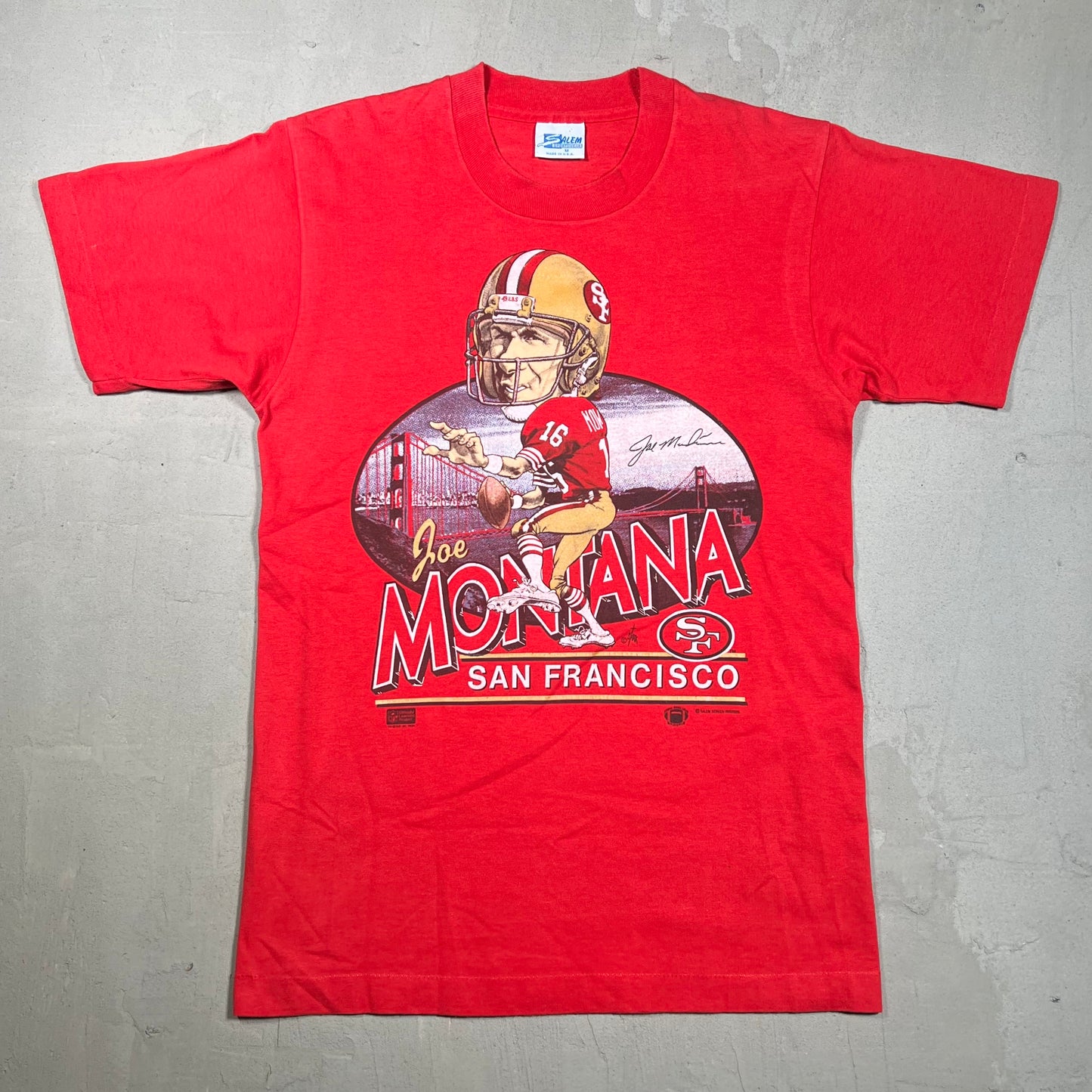 1987 Joe Montana San Franciso Cartoon Head Red Tee Size Medium USED v14617