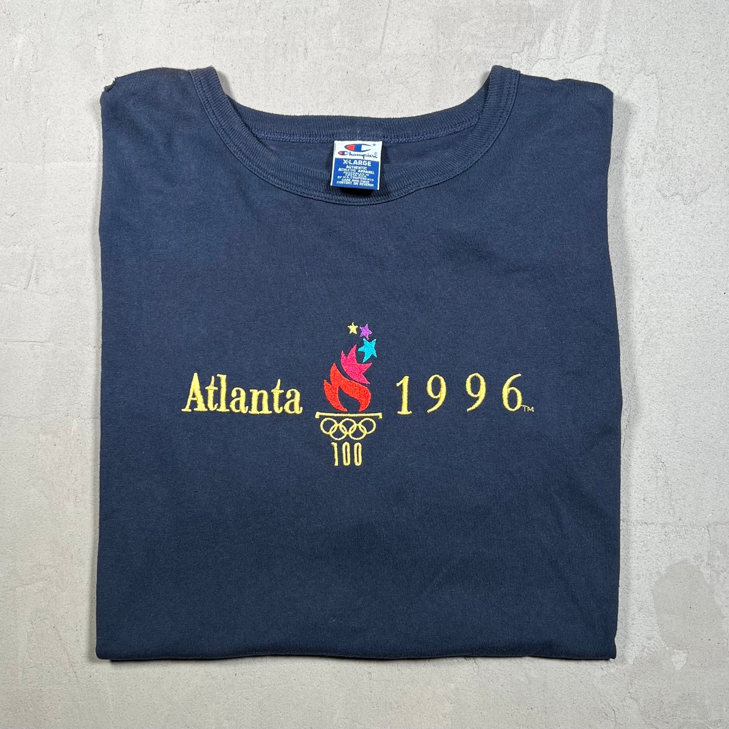 1996 Atlanta Olympic Champion Tag Navy Blue Tee Size XL USED v16378
