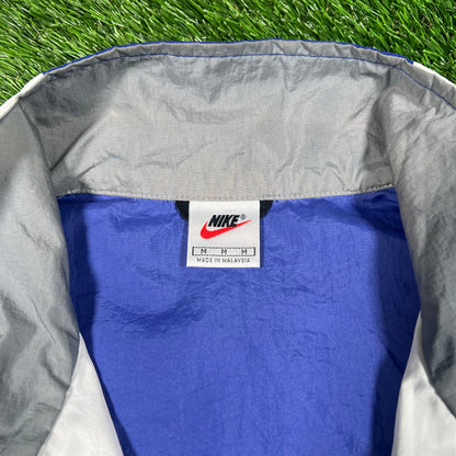 1990s Nike Blue/White Broken Swoosh Windbreaker Size Medium USED v18114