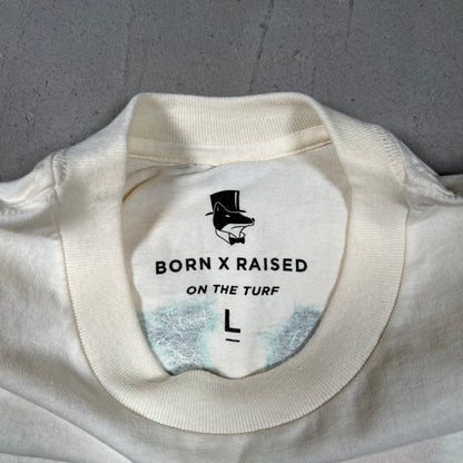 Born and Raised On The Turf Cream Tee Size Large USED x17525