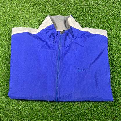 1990s Nike Blue/White Broken Swoosh Windbreaker Size Medium USED v18114