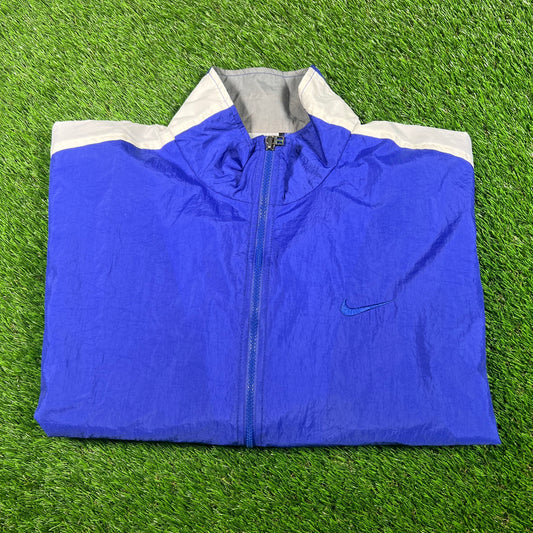 1990s Nike Blue/White Broken Swoosh Windbreaker Size Medium USED v18114