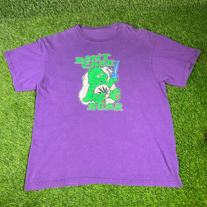 "Don't Care Bear" Purple Tee Size Medium USED v16634