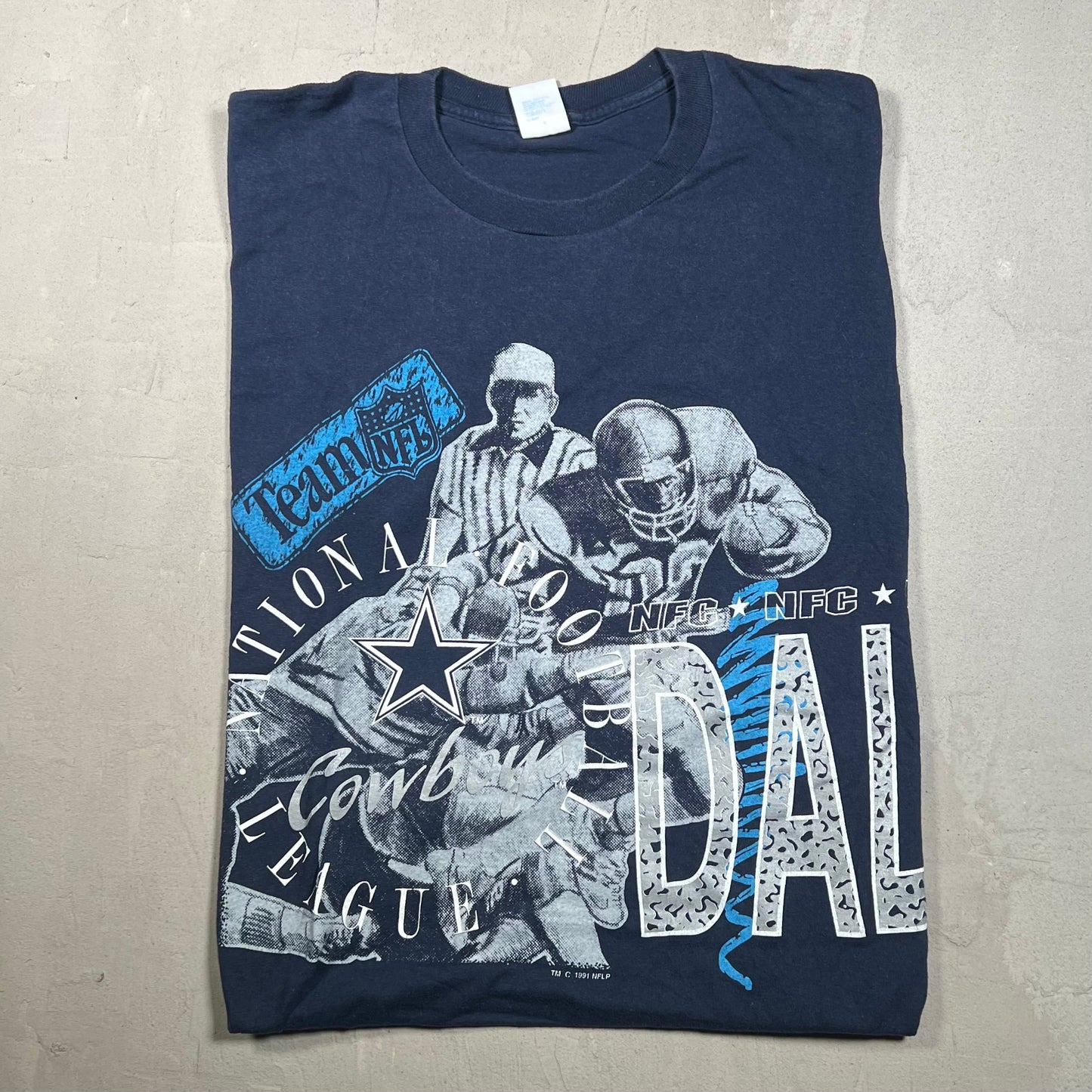 1991 Dallas Cowboys 7 Logo Tag Navy Blue Tee Size Large USED v19255