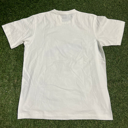 Kaws Uniqlo Brown Figure Carrying Blue White Tee Size Medium NEW x13807