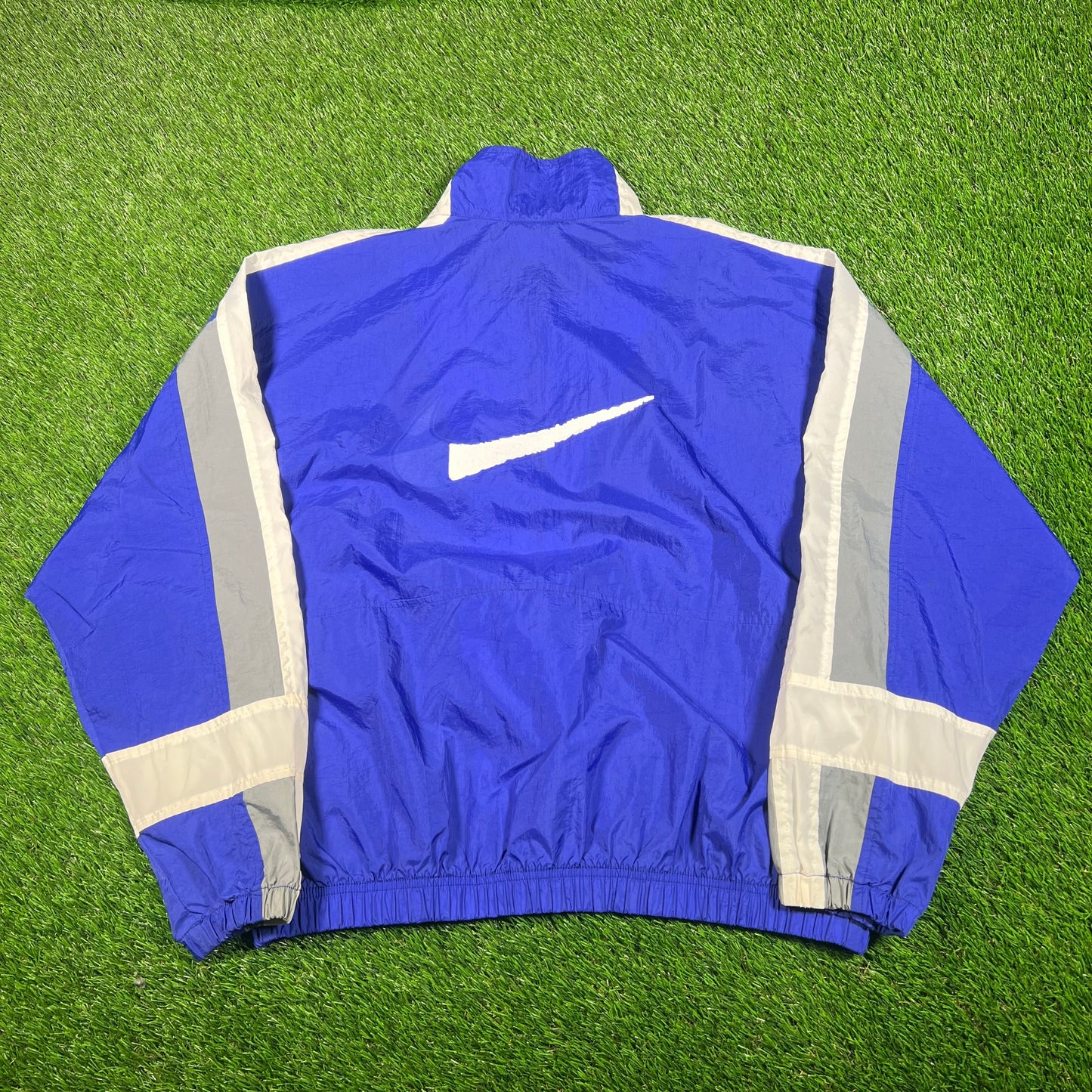 1990s Nike Blue/White Broken Swoosh Windbreaker Size Medium USED v18114