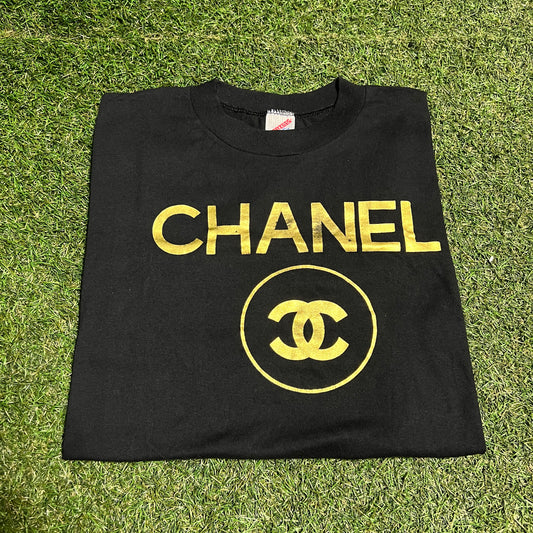 1990s Bootleg Chanel Gold Logo Jerzee Tag Black Tee Size XL USED v16056