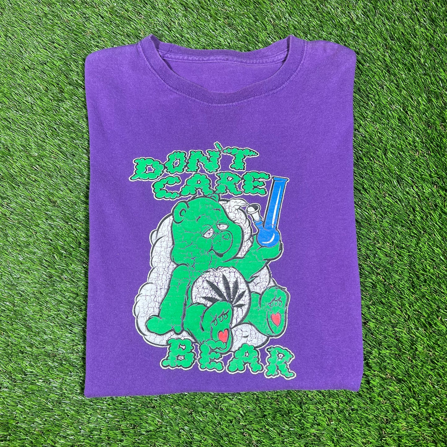 "Don't Care Bear" Purple Tee Size Medium USED v16634