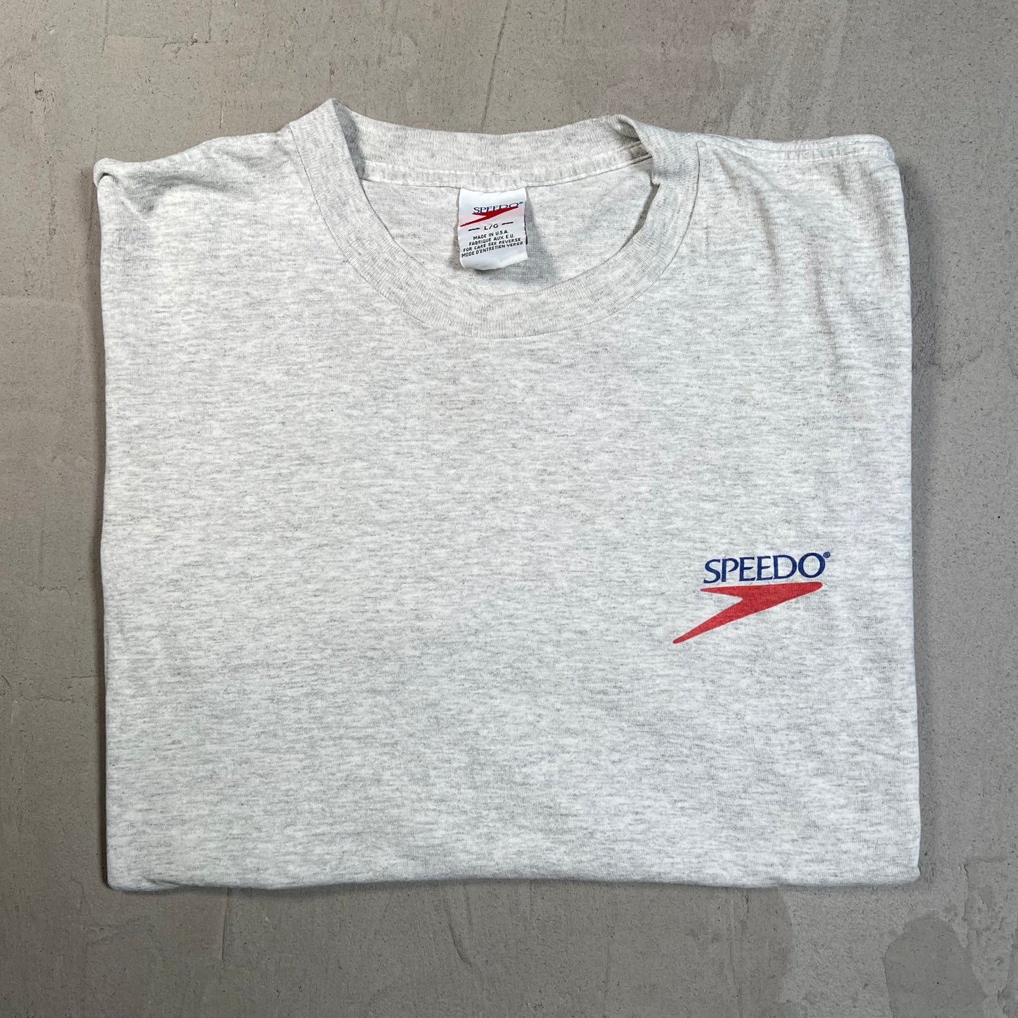 1990s Speedo Grey "Butt Kicked" Tee Size Large USED v19673