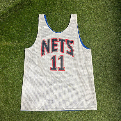 Nets and Magic Reversible Jersey Size Large USED v14250