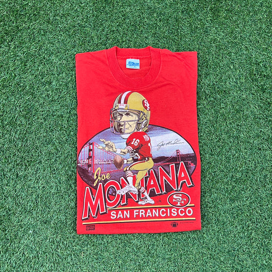 1987 Joe Montana San Franciso Cartoon Head Red Tee Size Medium USED v14617