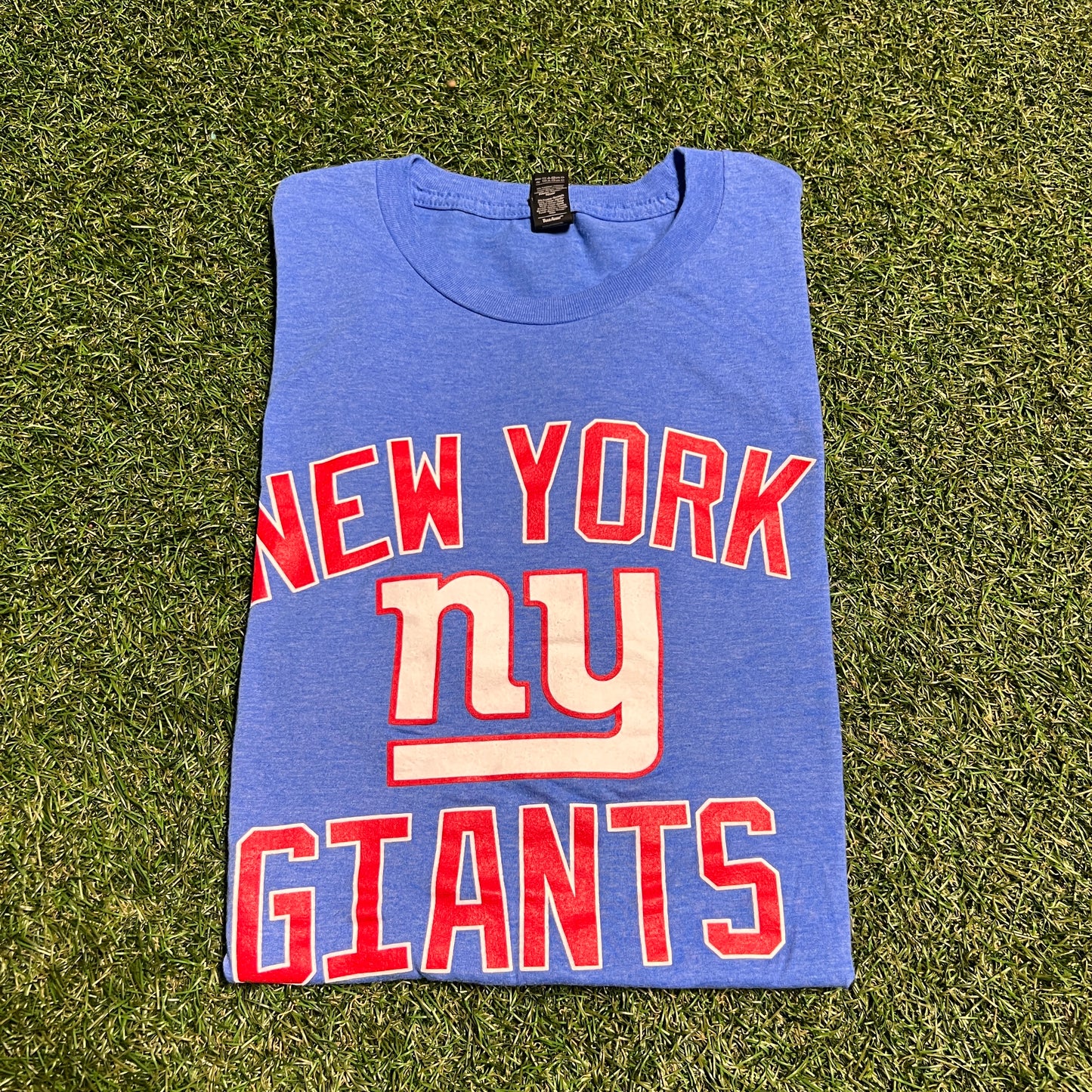 NY Giants baby blue modelo tee Size Large USED v14004